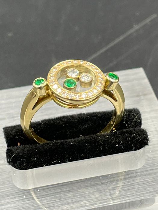 A Contemporary ring with floating diamonds and emeralds (Approximate Size N 1/2) - Image 3 of 3