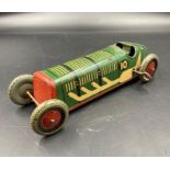 A Vintage tin racing car, made in England.