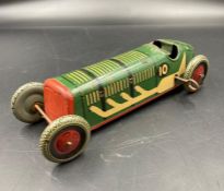 A Vintage tin racing car, made in England.