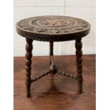 An oak carved circular table on bobbin tripod legs (H57cm Dia45cm)