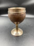 A silver and coconut shell goblet, hallmarked possibly London 1823 AF