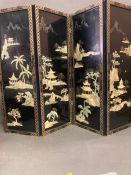 An oriental lacquered four panel screen with pearlised overlay (H90cm W121cm)