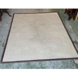 A cream natural fibre rug (222cm x 275cm)