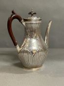A Robert Harper silver coffee pot, engraved armorial Brackenbury, hallmarked for London 1879 (