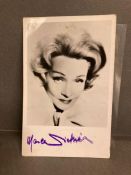 An autographed photo by Marlene Dietrich