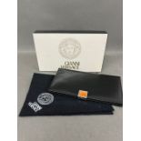 A Gianni Versace calf leather wallet with box and dust cover