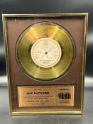 A gold framed disc, presented to Guy Fletcher of Dire Straits for "Money for Nothing" October 1985