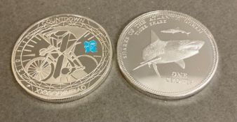 Two silver coins Sharks of The Atlantic Ocean and Countdown to the Olympiad.