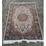 An Indian hand knotted silk rug