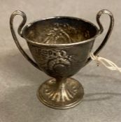 A miniature silver cup, hallmarked for Sheffield 1911 by Daniel George Collins