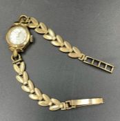 A 9ct gold ladies Accurist watch and decorative strap (Approximate Total Weight 10.8g)