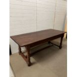 A large oak refectory table on turned legs (H77cm W213cm D90cm)