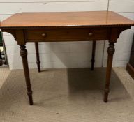 A hall table on turned legs and drawer to centre (H77cm W106cm D60cm)