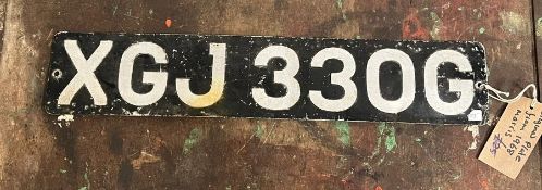 An original car number plate