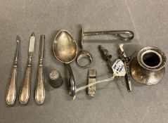 A selection of silver curios, to include thimble,