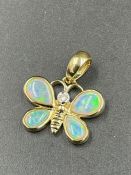 An 18ct yellow gold and opal Butterfly pendant