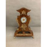 A French mantel clock with enamel face