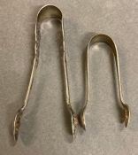 Two pairs of hallmarked silver sugar nips