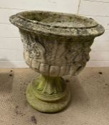 A garden planter on base with lions to sides (H62cm Dia54cm)