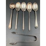 A selection of silver teaspoons, sugar nip, mustard spoon, various hallmarks and makers