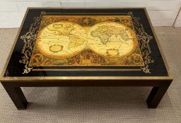 A Maison Jansen mahogany table, brass edge glass world map on top 1960's (H43cm W106cm D74cm)