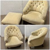 A pair of button back tub chairs on turned legs and castors, along with a matching footstools