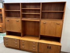 A Mid Century wall units, three modular units with pull down fronts to reveal desk and drink cabinet