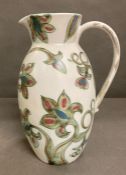 A Scottish stoneware jug with floral pattern