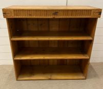 An open pine bookcase (H91cm W94cm D31cm)