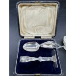 A Boxed silver set of Baby spoon and pusher, hallmarked for Birmingham 1916 by Levi & Salaman (54.