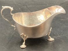 A silver sauce boat, hallmarked for Birmingham 1931and made by Ollivant & Botsford (Approximate