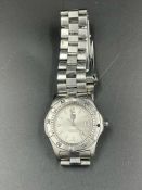 A Ladies Tag Heuer Professional 200 metres