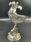 A silver cup supported by unicorn on stand base and dragon finial, hallmarked for London 1901 and