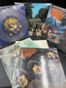 A small selection of records, several by Beatles