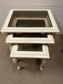 A set of three nesting tables with glass centre (H37cm Sq34cm)