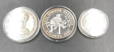 Three silver proof Turks and Caicos coins: Atlanta 1996 Five Crowns, Summer Olympics 1996, Queen
