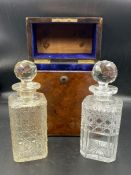 Two decanters in walnut and brass bound box (no key)