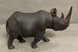A carved wooden rhino