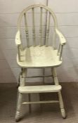 A child's Windsor high chair