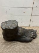 A bronzed foot