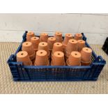 A selection of small terracotta garden pots