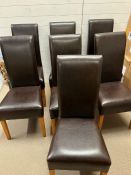 Eight faux leather dining chairs