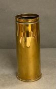 A polished brass shell casing