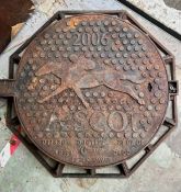 An Ascot racecourse man hole cover, stamped 2006 Ascot