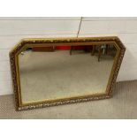 An over mantle mirror with gilt frame