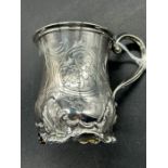 A small Victorian tankard with four acanthus leaf feet, hallmarked for London 1854, makers mark