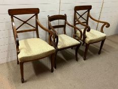 Three William IV style dining chairs with splat backs and scrolling arms