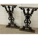 A pair of cast metal table ends, Victorian. (68cm x 40cm)