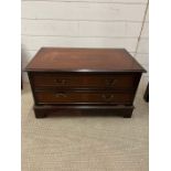 A mahogany style media unit with faux drawers, pulling down to cupboard by Brights of Nettlebed