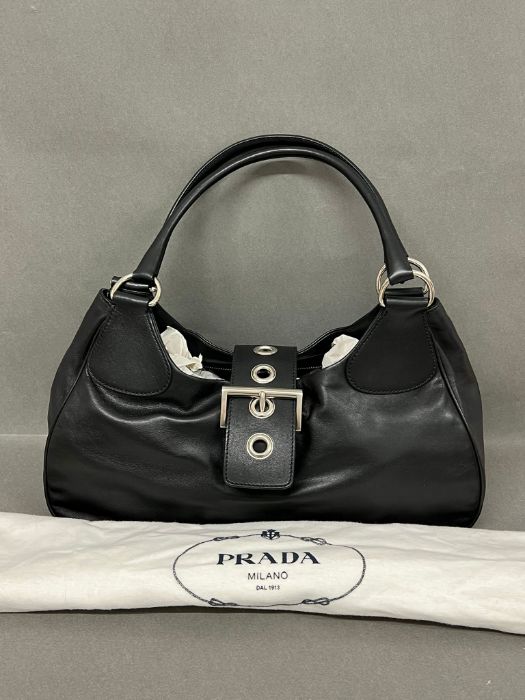 A Prada black leather Vitello Moon saddlebag with dust cover and authenticity card (W40cm)